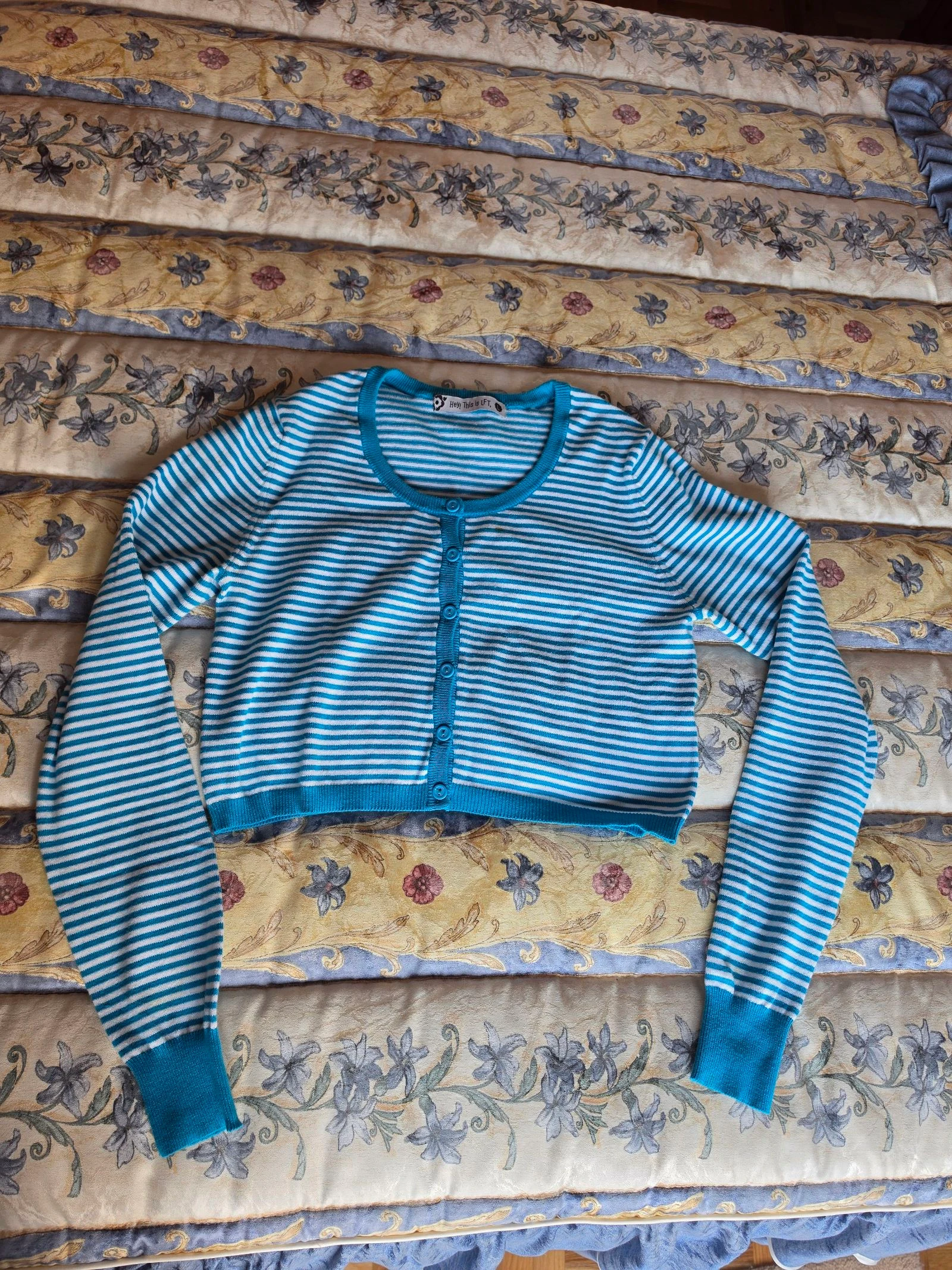 Chaqueta corta de rayas en azul clara talla L